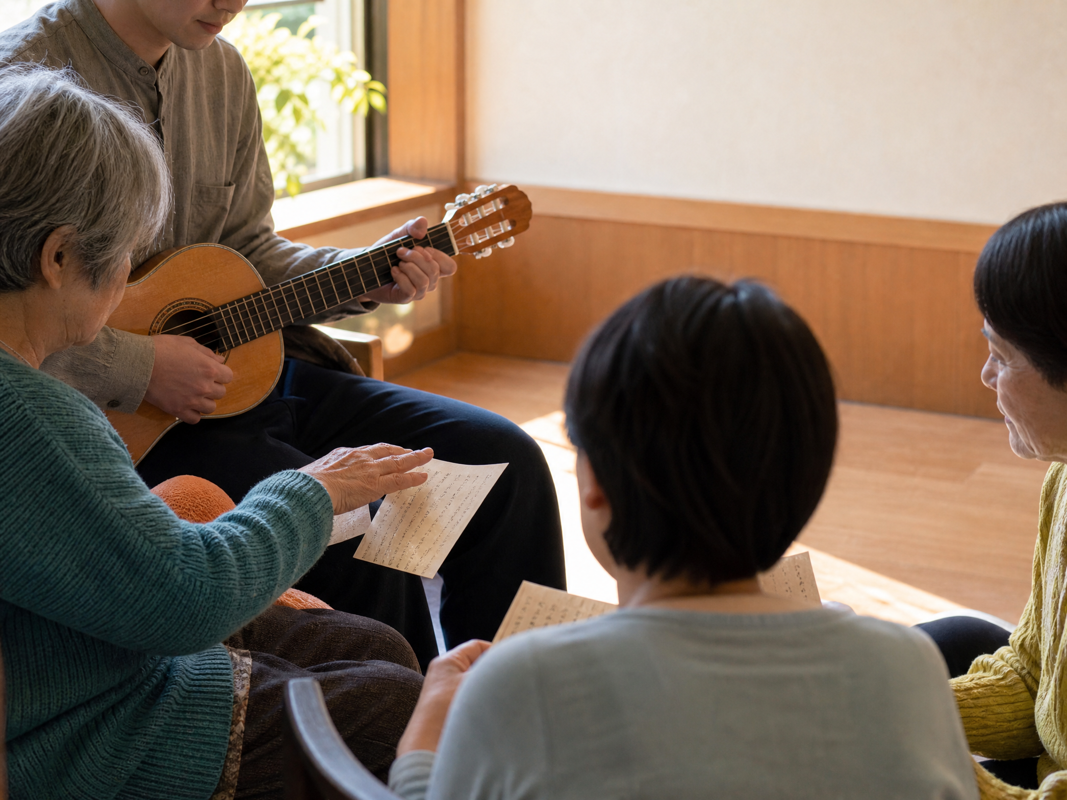 音楽を囲みながら言葉を交わす地域の集まり
